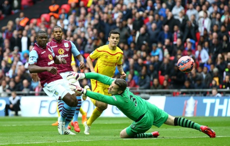Philippe Coutinho scores the opening goal past Shay Given.