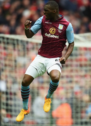 Christian Benteke celebrates his equaliser.