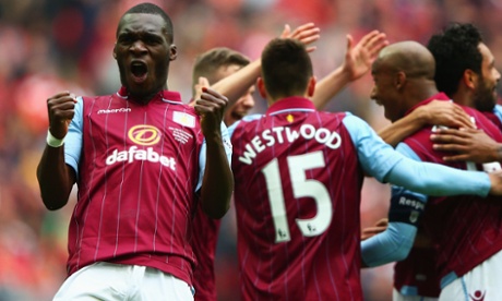 Christian Benteke of Aston Villa celebrates after Fabian Delph of Aston Villa scored their second.