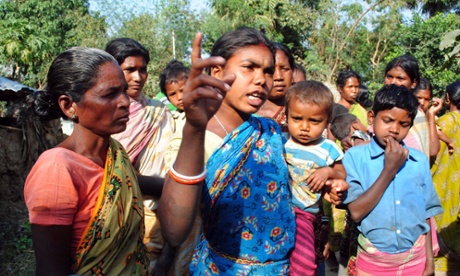 A Santhal tribal woman speaks to journalists in connection with the gang rape in Subalpur village in West Bengal.