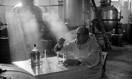 26th December 1953:  Brother Laurent, a Carthusian monk, mixes the ingredients for the famous Chartreuse liqueur in a factory near the monastery of the Grande Chartreuse in Dauphine, south-eastern France.  