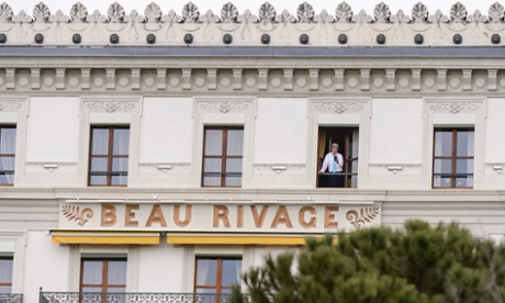 US secretary of state John Kerry at a window of the Beau Rivage Palace hotel, where Iran nuclear talks are taking place, on Thursday.