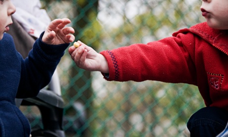 Children sharing a snack