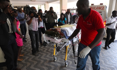 Medics help an injured person at Kenyatta national  hospital in Nairobi after being airlifted from Garissa.