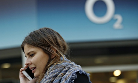 woman speaking on a mobile telephone outside O2 