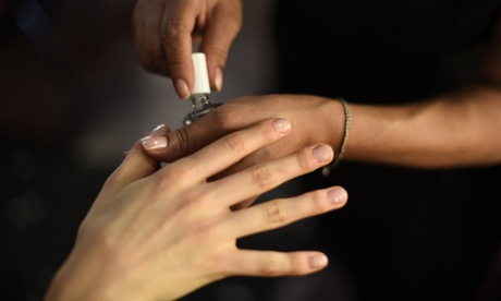 Manicures backstage at the Simone Rocha show, with Essie’s iridescent white shade Waltz.