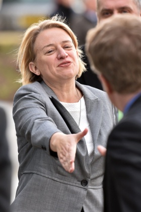 Natalie Bennett shakes a hand as she arrives at the ITV studios.