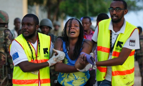 A woman is rescued from the building where she had been held hostage during an attack by al-Shabab.