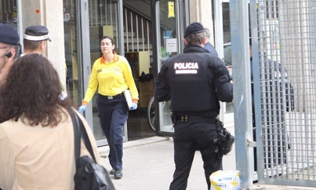 Police outside the Instituto Joan Foster in Barcelona.