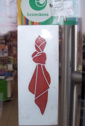 Foton's knotted handkerchief logo that shops use to show they are part of the dementia initiative.