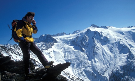 Man skiing while on the phone