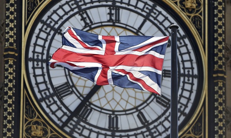 The Union Flag flutters in front of the Big Ben clock tower on the Houses of Parliament in London