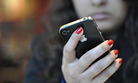 Woman holding an iPhone