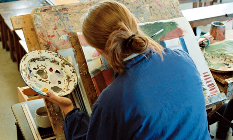 A secondary school student painting
