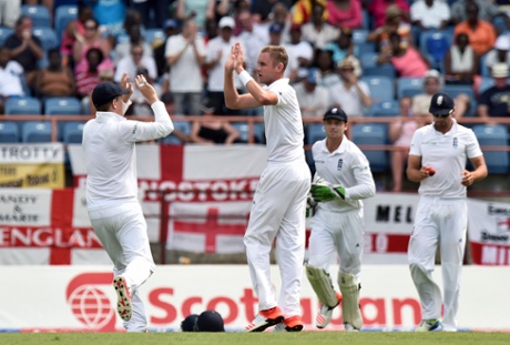 Stuard Broad, centre, celebrates with teammates after dismissing Darren Bravo.