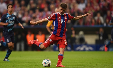 Thomas Müller fires his precise shot into the back of the net.