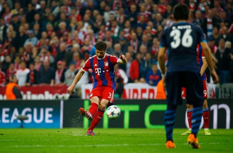 Xabi Alonso fires a free-kick over the wall ...