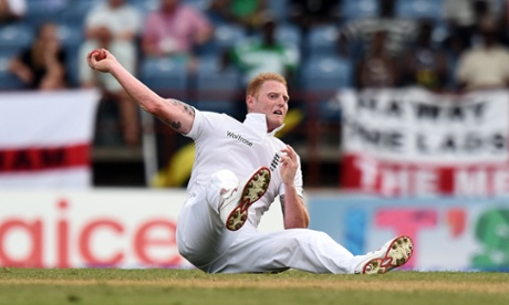 England's bowler Ben Stokes fields a ball played by West Indies batsman Marlon Samuels.