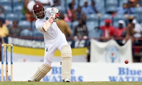 West Indies batsman Marlon Samuels hits a boundary off England's bowler Stuart Broad whilst on his way to his half century.