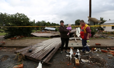 Colleen and Stephen Jones stand where their house once stood after it was swept away during flooding in the town of Dungog, also in the Hunter region.