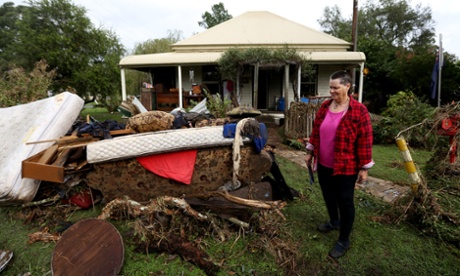 Mary O'Dell surveys the damage to her house caused by flooding in Stroud.