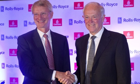 Rolls-Royce chief John Rishton (left) shakes hands with Emirates Airlines President Tim Clark after signing a £6.1bn aircraft engine deal.