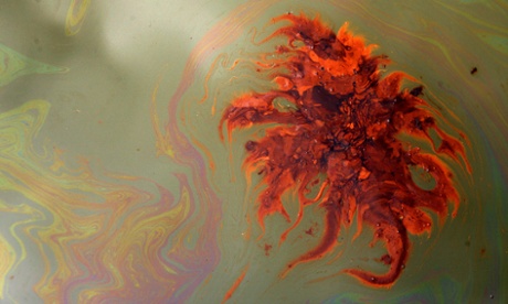 OIl clouds the surface of Barataria Bay June 19, 2010 near Port Sulpher, Louisiana. The BP oil spill has been called one of the largest environmental disasters in American history.