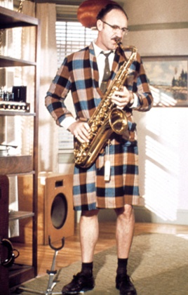 Suited and booted … Hackman plays the sax earlier in The Conversation