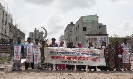 Relatives and former Rana Plaza workers demand their compensation in front of the site of the tragedy in Savar, near Dhaka, Bangladesh.