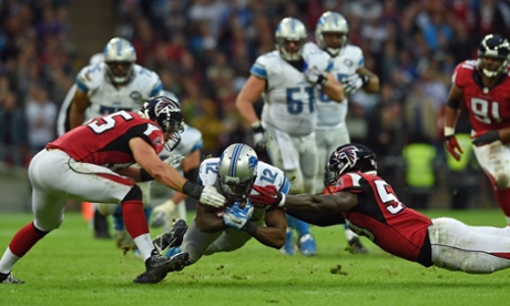 Detroit Lions wide receiver Jeremy Ross (12), centre, makes a down during the NFL football game against Atlanta Falcons at Wembley Stadium, London, Sunday, Oct. 26, 2014.  (AP Photo/Tim Ireland)NFLACTION13;