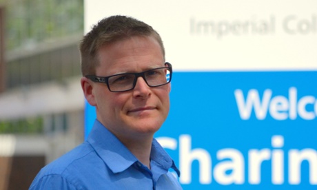 Matt Williams in front of the Imperial College Trust sign.