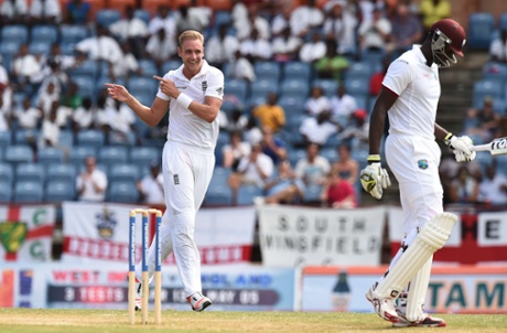 England bowler Stuart Broad celebrates as a dejected Jason Holder stomps back to the pavillion.