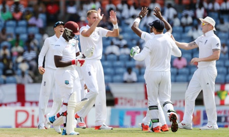 Smiles all round as Stuart Broad takes the wicket of West Indies' Kemar Roach.