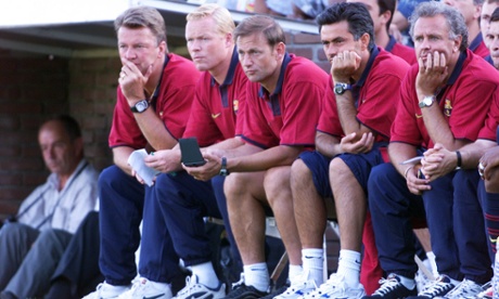 From right to left, the then Barcelona manager Louis van Gaal, assistant coach Ronald Koeman,  keeper's trainer Frans Hoek and assistant trainer José Mourinho during a friendly in Amsterdam in 1999