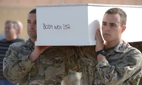 Maltese soldiers carry the coffin of a baby during the funeral ceremony for 24 migrants who died when a boat carrying migrants capsized off the Libyan coast last weekend.