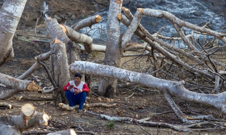 Local man with mobile phone in Sumbawa island, Indonesia.