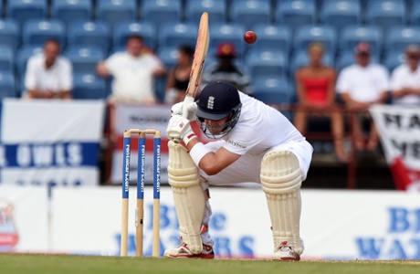 Jonathan Trott ducks a Shannon Gabriel bouncer.