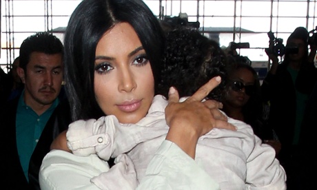 Kim Kardashian with her first child, North West