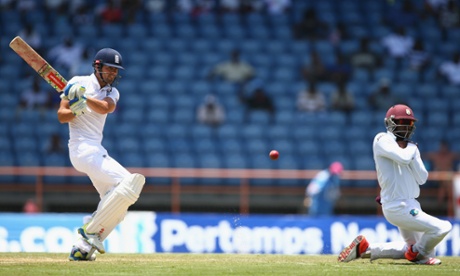 Jermaine Blackwood tries to take evasive action as Cook hits to the onside.