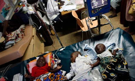 Three babies with severe malaria receive a blood transfusion in the Siaya hospital in western Kenya.