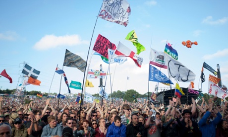 Glastonbury Festival 2013. Saturday 29 June. The crowd watch Primal Scream play the Pyramid stage on Saturday evening