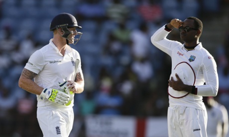 Marlon Samuels salutes Ben Stokes as he leaves the field.