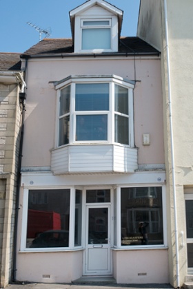 The Loss Adjusters’ office in the village of Easton: the first location on Palmer’s audio walking tour.  Palmer lived in the flat above the shop while she was writing the piece.