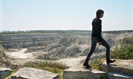 Different layers of stone are visible in the walls of Bowers quarry on Portland.