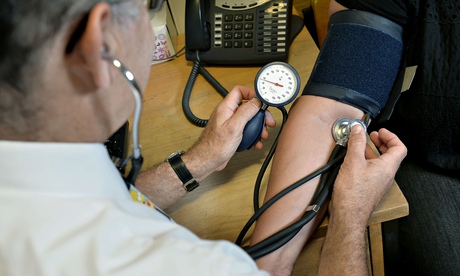 A doctor checks a patient's blood pressure. 'Labour and the SNP, together with the Green Party, Plai