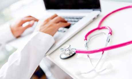 Doctor working on a laptop at the office
