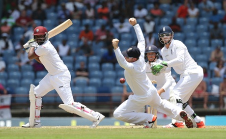 Darren Bravo hits one past the diving Bell.