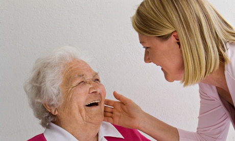 Young woman caring for older woman