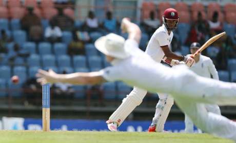 Kraigg Brathwaite's shot evades Ben Stokes.