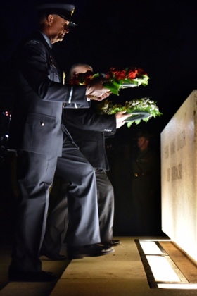 Wreaths are laid by Air Commodore Shaun Clarke of the New Zealand Air Force left and veteran Peter Eveille.